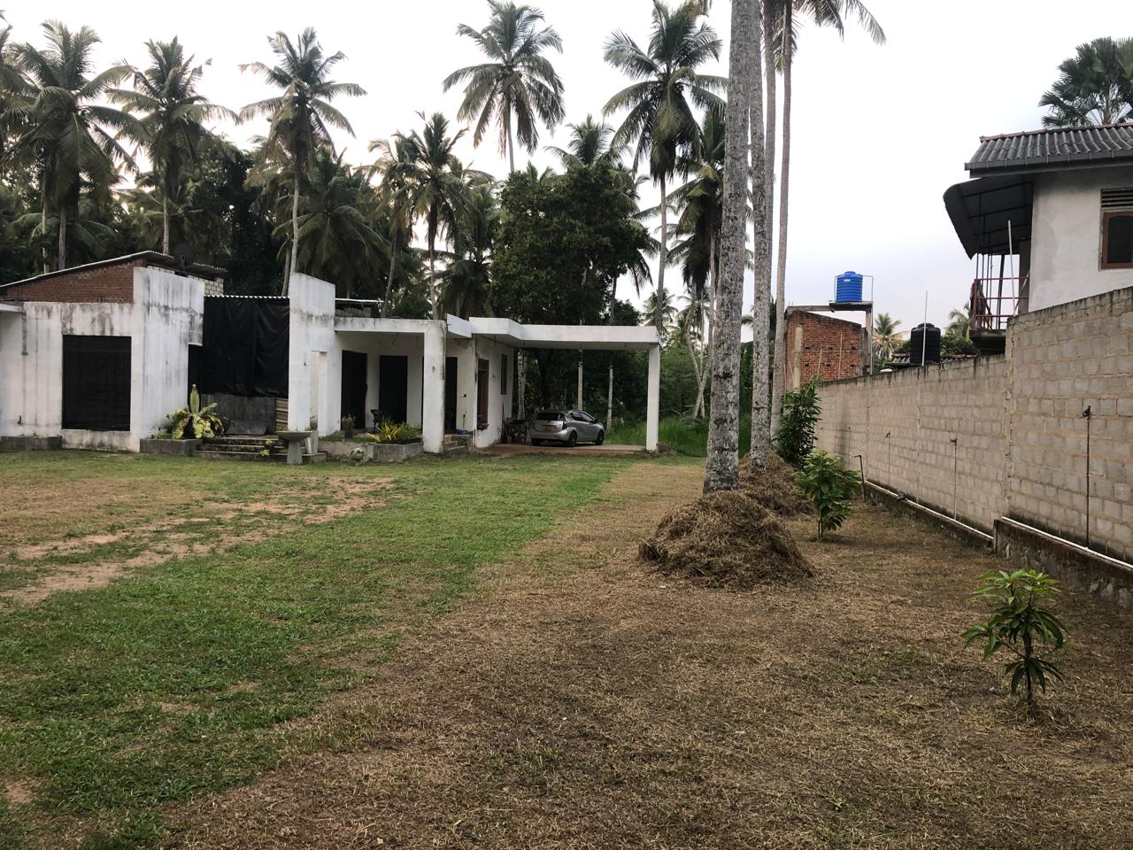 LAND WITH UNDER CONSTRUCTION HOUSE