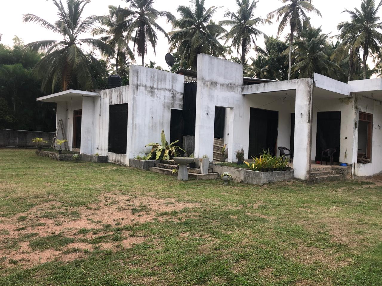 LAND WITH UNDER CONSTRUCTION HOUSE