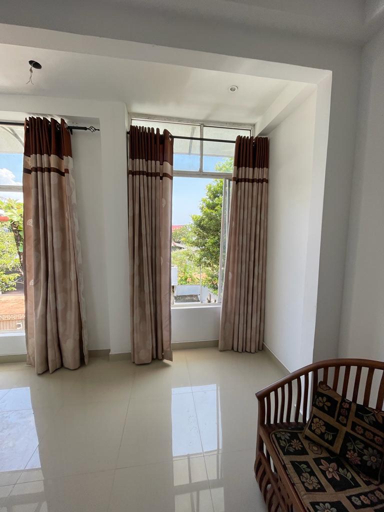 Spacious 4-Bedroom Three-Storey House for Sale in Ekala