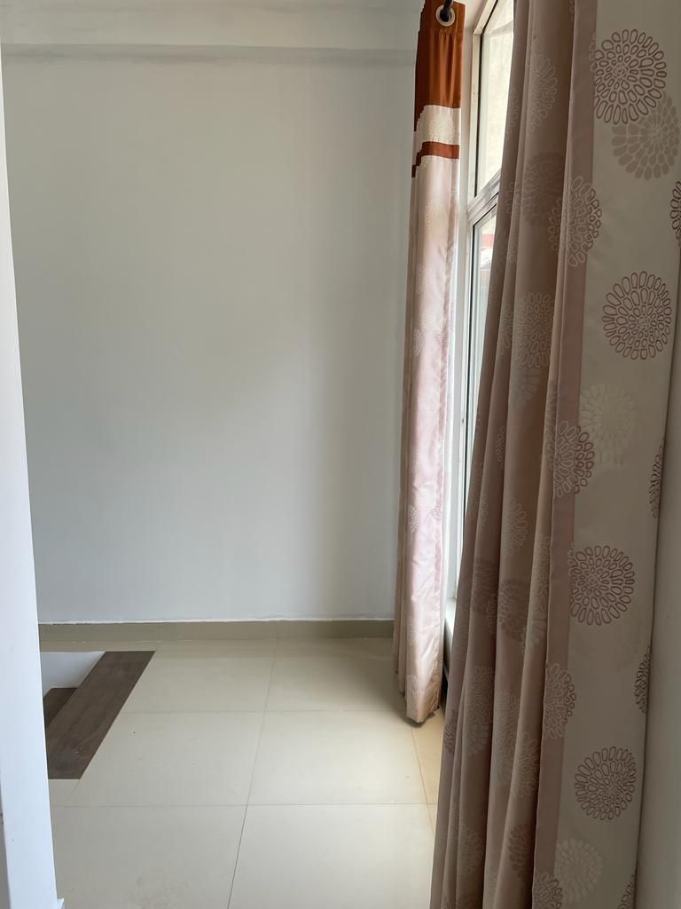 Spacious 4-Bedroom Three-Storey House for Sale in Ekala